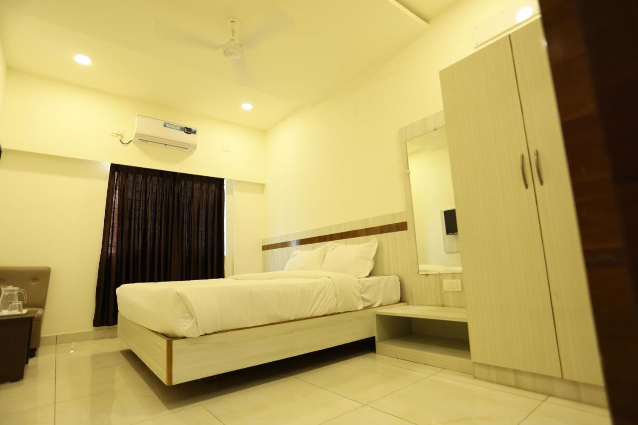 Hotel Sigma Suites Бангалор Экстерьер фото