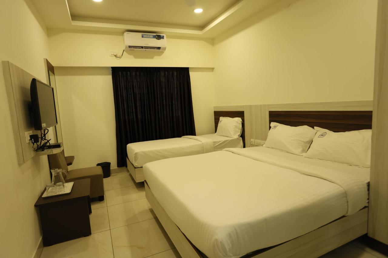 Hotel Sigma Suites Бангалор Экстерьер фото