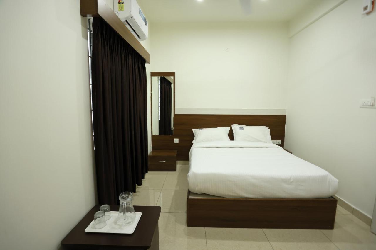 Hotel Sigma Suites Бангалор Экстерьер фото