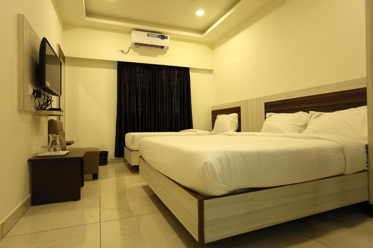 Hotel Sigma Suites Бангалор Экстерьер фото
